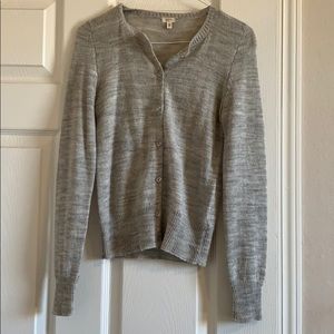 Full sleeve button down crew neck sweater.